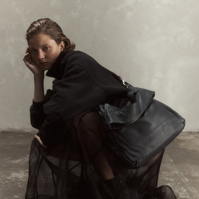 Elude messenger bag, leather and suede