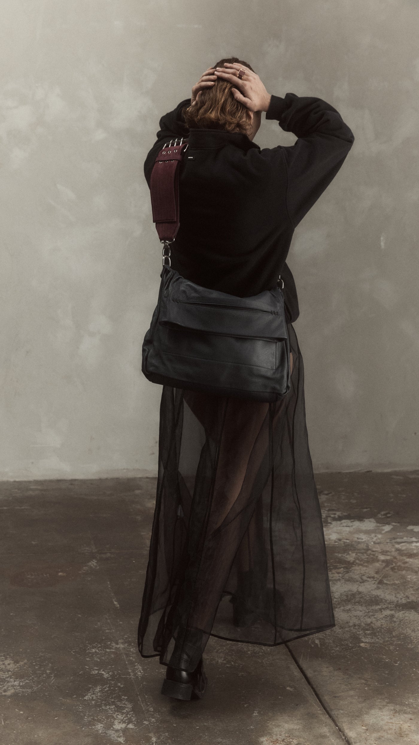 Elude messenger bag, leather and suede
