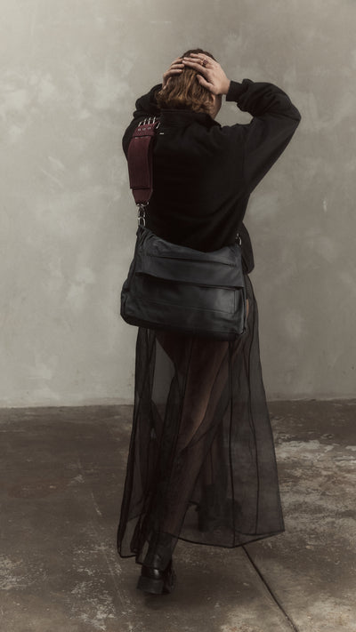 Elude messenger bag, leather and suede